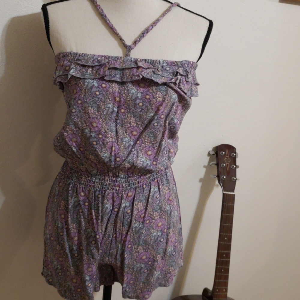 Brand new, no tags. Adorable purple romper